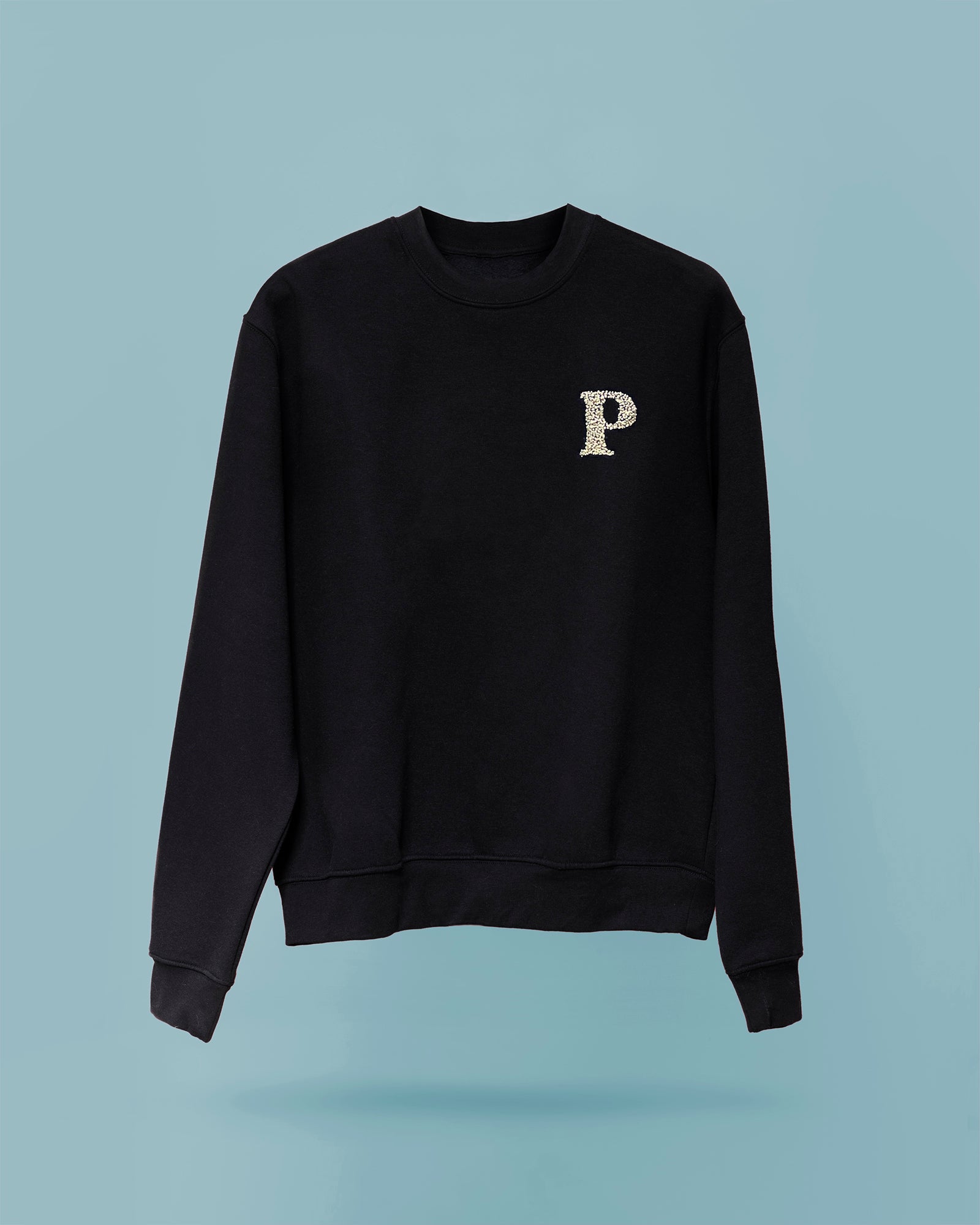 SUDADERA 1 INICIAL LATERAL BEIGE